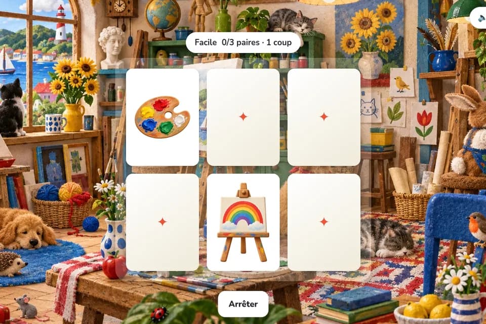 Six cartes de memory, dont deux révèlent une palette et un chevalet avec un arc-en-ciel, sont disposées dans un atelier coloré.